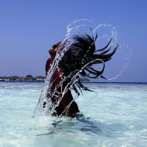 Girl in the ocean iPad Wallpaper