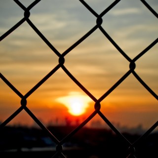 jorge quinteros - fence sunset ipad wallpaper